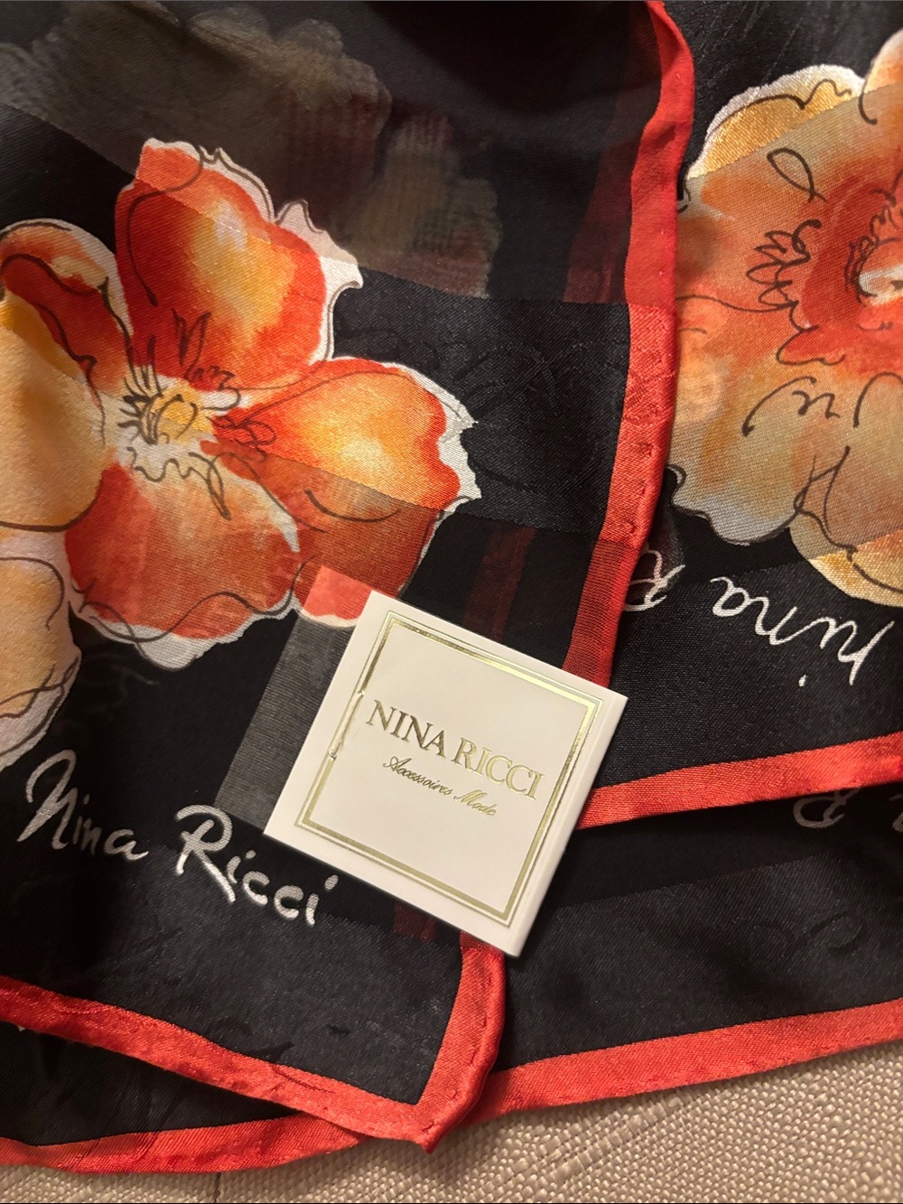 Nina Ricci Black Scarf with Orange Floral Motif